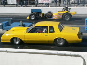 Yellow Monte Carlo Drag Car